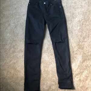 Black jeans with knee cut